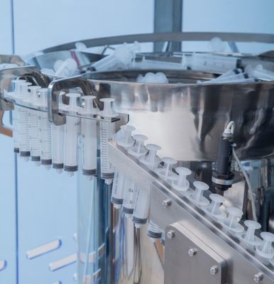 Riempitrice automatica per siringhe in plastica con certificazione CE