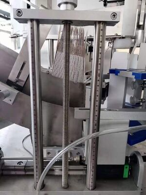 Macchine per caricare scatole a rotazione verticale multifunzione