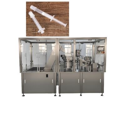 Macchina automatica di riempimento e chiusura di siringhe di plastica per liquidi e gel